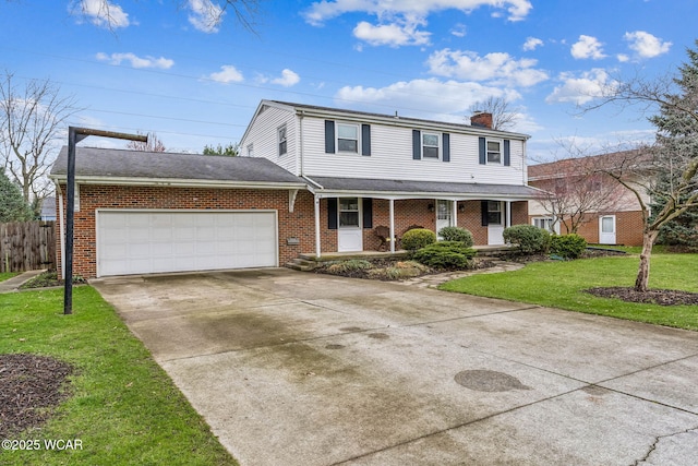 traditional home featuring a front yard, a porch, an attached garage, a chimney, and brick siding