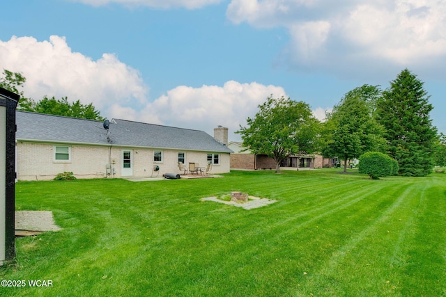 236 Lincoln Dr, Celina, OH 45822 - view of green lawn featuring a patio area