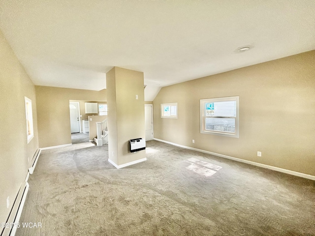 514 Fairview Ave, Lima, OH 45804 - unfurnished living room featuring carpet, heating unit, and a baseboard heating unit