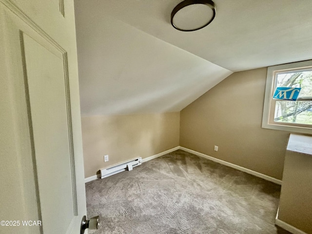 514 Fairview Ave, Lima, OH 45804 - additional living space with carpet floors, baseboards, vaulted ceiling, and baseboard heating
