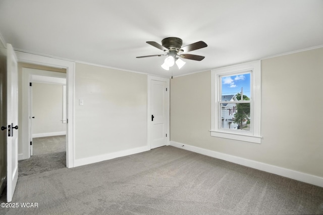 517 Marian Ave, Lima, OH 45801 - carpeted spare room with ceiling fan and baseboards