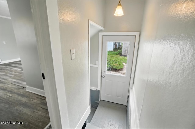 517 Marian Ave, Lima, OH 45801 - entryway with baseboards and dark wood finished floors