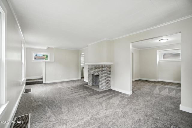 517 Marian Ave, Lima, OH 45801 - unfurnished living room with carpet flooring, ornamental molding, a brick fireplace, and stairs