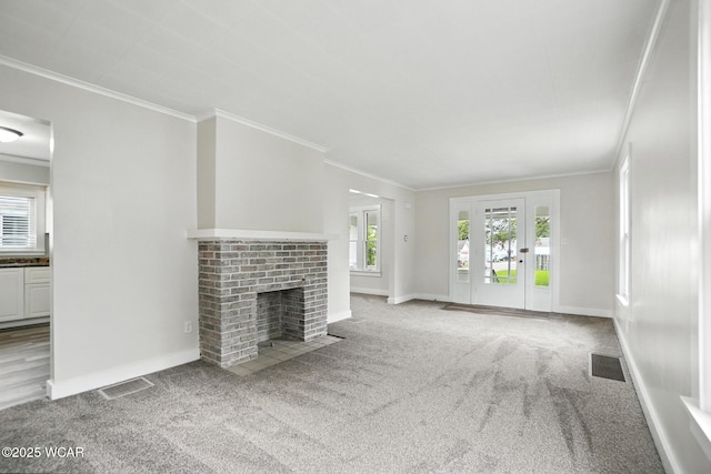 517 Marian Ave, Lima, OH 45801 - unfurnished living room featuring carpet floors, ornamental molding, and a fireplace