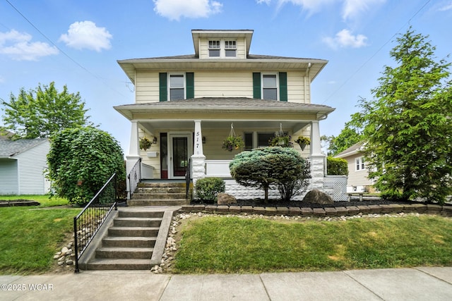 517 Marian Ave, Lima, OH 45801 - american foursquare style home featuring a porch and a front yard
