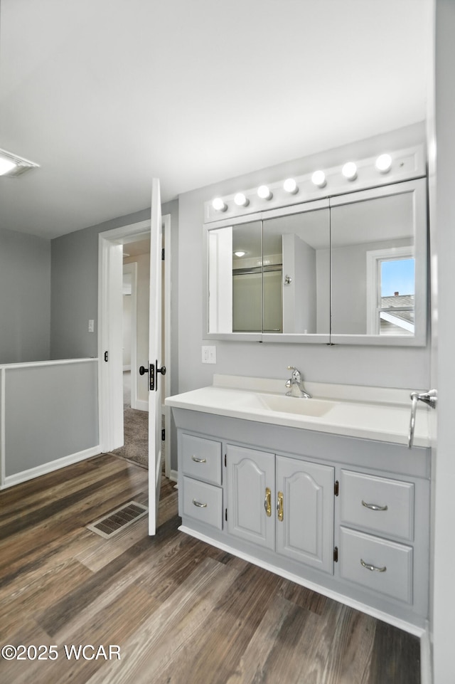 517 Marian Ave, Lima, OH 45801 - bathroom featuring wood finished floors and vanity
