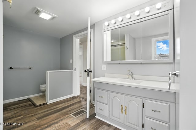 517 Marian Ave, Lima, OH 45801 - bathroom featuring vanity and wood finished floors