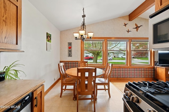 216 N Rauthland Ave, Wapakoneta, OH 45895 - dining area with vaulted ceiling and a chandelier