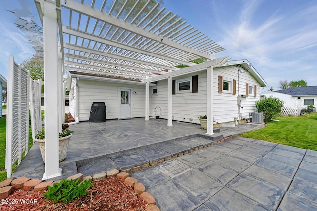 216 N Rauthland Ave, Wapakoneta, OH 45895 - view of patio with a pergola and central air condition unit