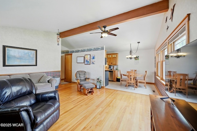 216 N Rauthland Ave, Wapakoneta, OH 45895 - living room featuring a chandelier, light wood-type flooring, and a ceiling fan