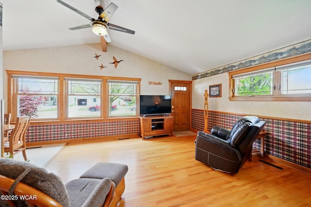 216 N Rauthland Ave, Wapakoneta, OH 45895 - living room featuring a wainscoted wall, light wood finished floors, wallpapered walls, and ceiling fan