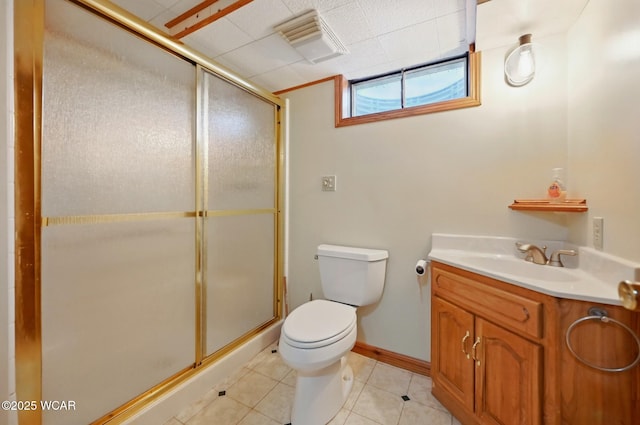 216 N Rauthland Ave, Wapakoneta, OH 45895 - bathroom with toilet, a shower stall, tile patterned floors, vanity, and baseboards