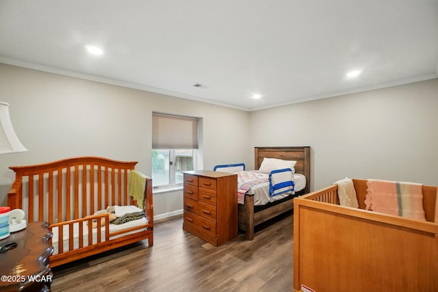 2635 Adgate Rd Unit 1D # 210, Lima, OH 45805 - bedroom with wood finished floors, crown molding, recessed lighting, and baseboards