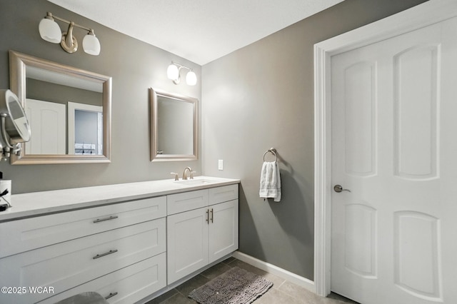 2635 Adgate Rd Unit 1D # 210, Lima, OH 45805 - bathroom with vanity, tile patterned flooring, and baseboards
