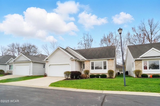 single story home with a front lawn, driveway, brick siding, an attached garage, and a shingled roof