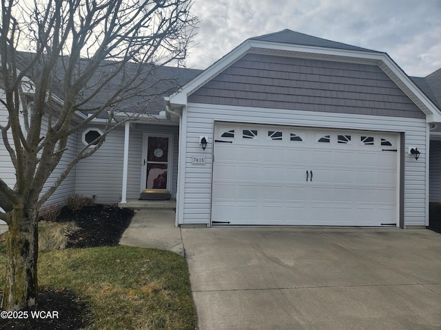 single story home with a garage