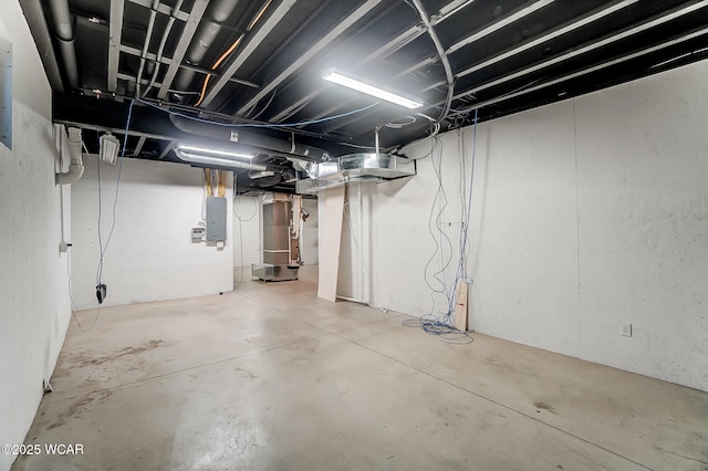 unfinished basement with electric panel and heating unit