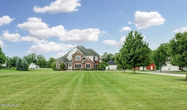 view of front of property with a front yard