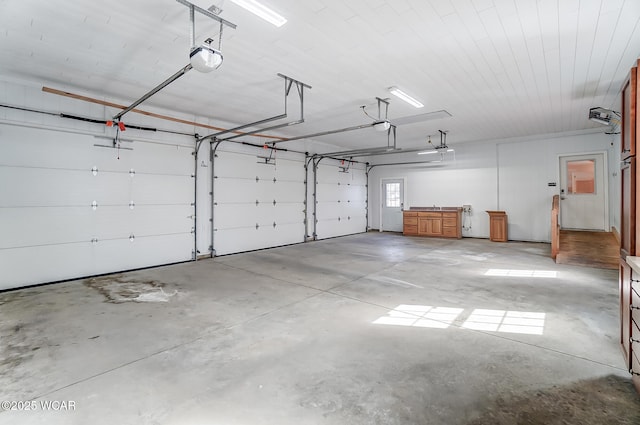 garage featuring a garage door opener