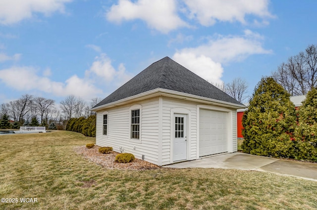 view of property exterior featuring roof with shingles and a lawn