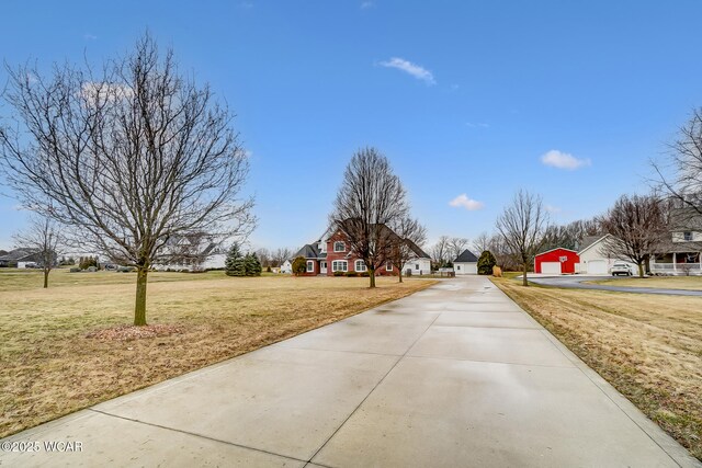 view of front of property with a yard