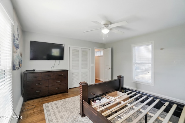 1826 W High St, Lima, OH 45805 - bedroom with a closet, wood finished floors, multiple windows, and ceiling fan