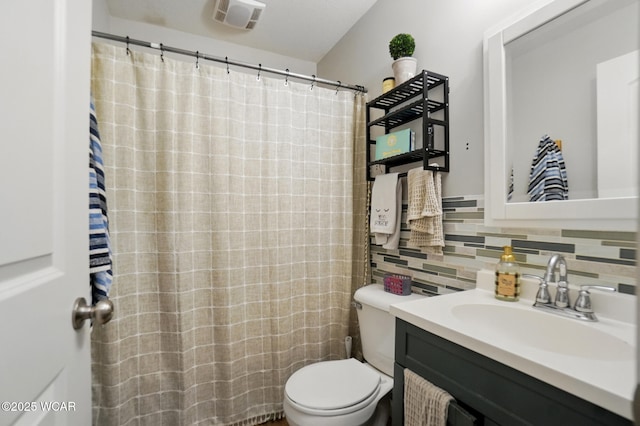 1826 W High St, Lima, OH 45805 - bathroom featuring toilet, tasteful backsplash, vanity, and curtained shower
