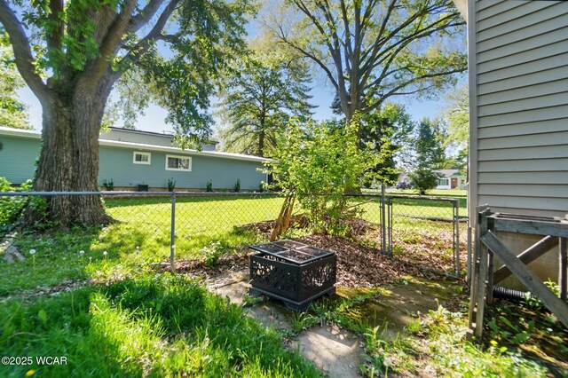 1826 W High St, Lima, OH 45805 - view of yard featuring an outdoor fire pit