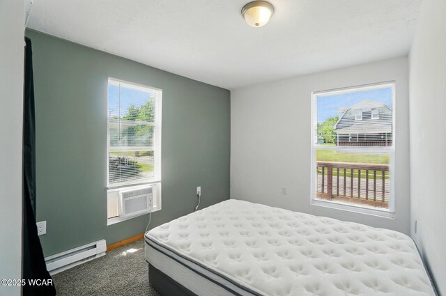 1151 S Central Ave, Lima, OH 45804 - carpeted bedroom featuring a baseboard heating unit and cooling unit