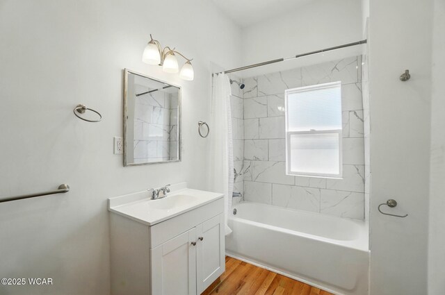 1151 S Central Ave, Lima, OH 45804 - full bathroom with vanity, shower / bath combo, and wood finished floors