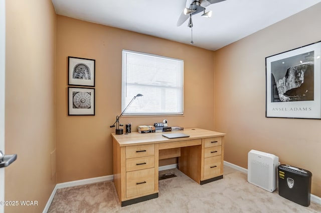 home office with ceiling fan and light colored carpet