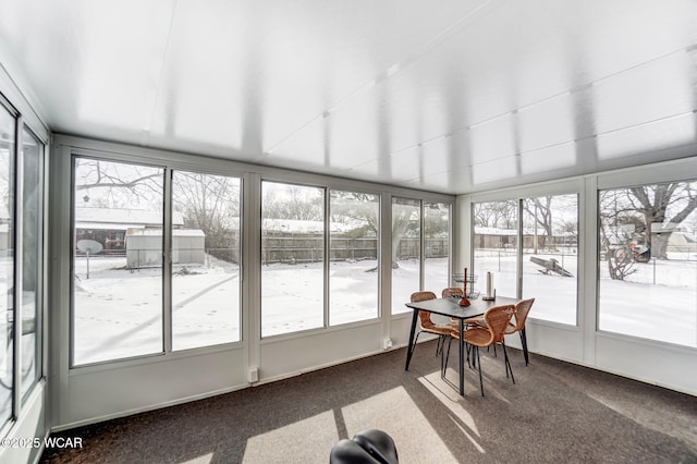 sunroom / solarium featuring plenty of natural light