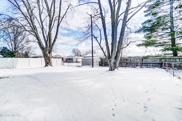 view of snowy yard