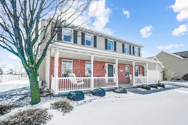 view of front of home featuring covered porch