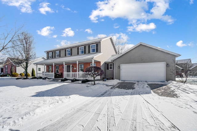 view of front of property with a porch and a garage