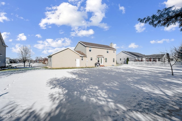 view of snow covered property