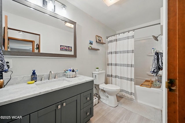 full bathroom with toilet, vanity, and shower / bathtub combination with curtain