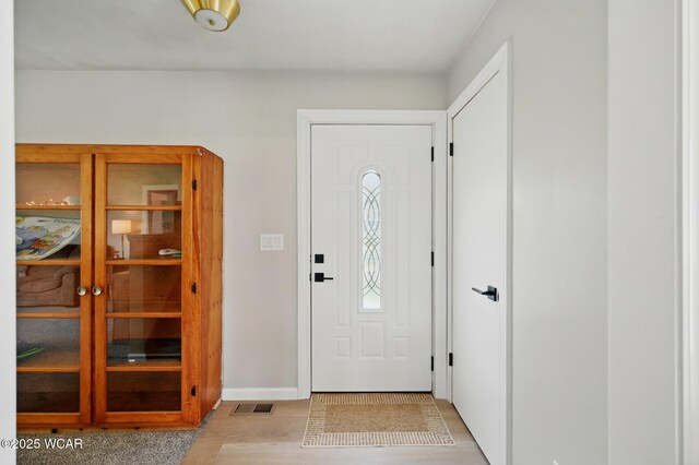2636 Debbie Dr, Elida, OH 45807 - foyer with light wood finished floors and baseboards