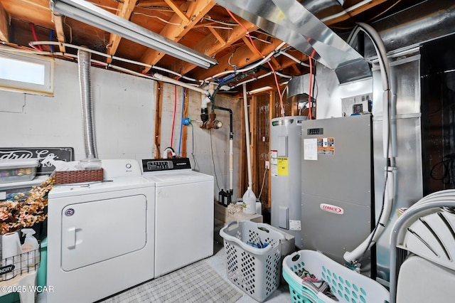 2636 Debbie Dr, Elida, OH 45807 - laundry area featuring washing machine and clothes dryer and water heater