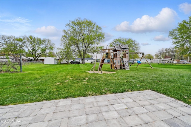 2636 Debbie Dr, Elida, OH 45807 - view of grassy yard featuring a playground and a storage unit