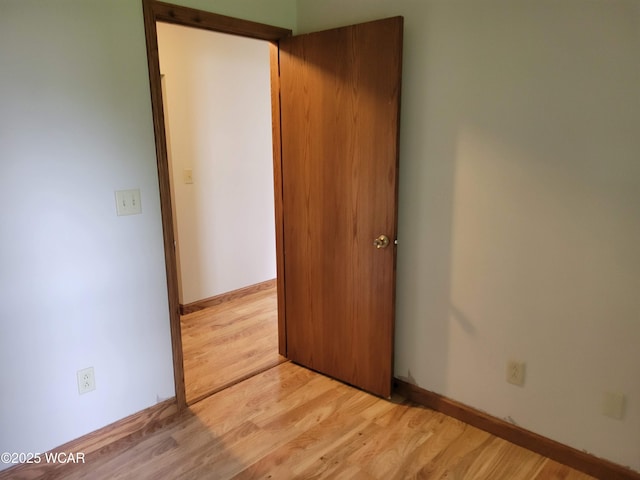 440 Edwards St, Ada, OH 45810 - unfurnished bedroom with light wood-type flooring and baseboards