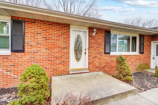 property entrance with a patio