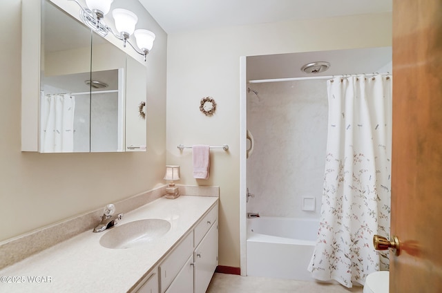 bathroom with vanity and shower / bath combo