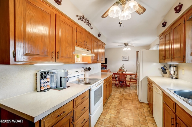 kitchen featuring sink, white appliances, and ceiling fan