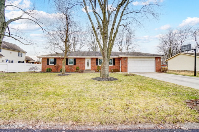 ranch-style house featuring a garage, central AC unit, and a front yard