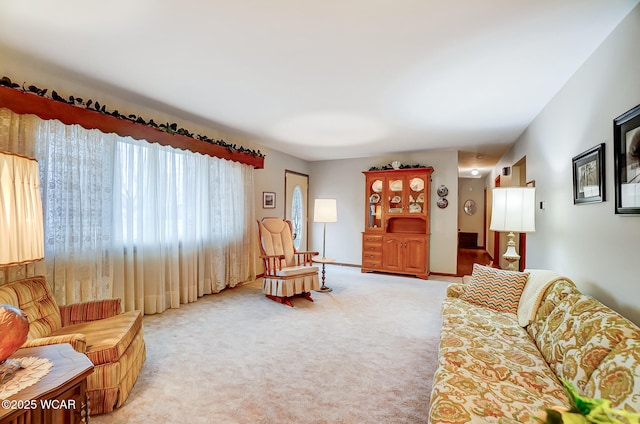 living room with light colored carpet