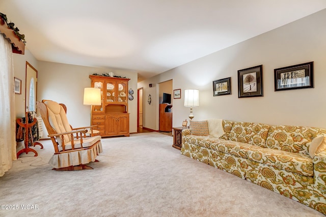 living room featuring light carpet