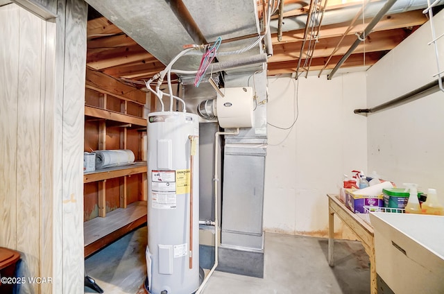 utility room featuring water heater