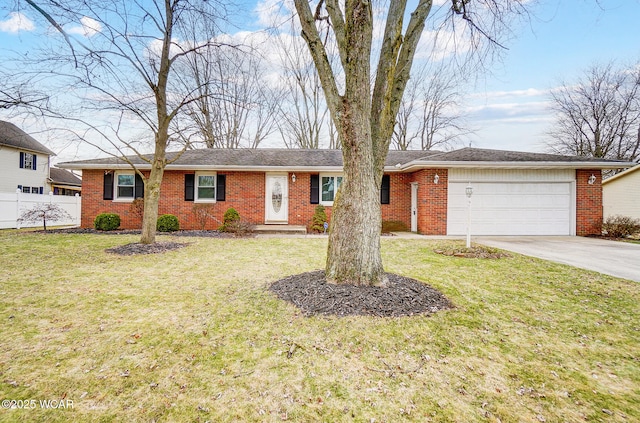 single story home with a garage and a front yard