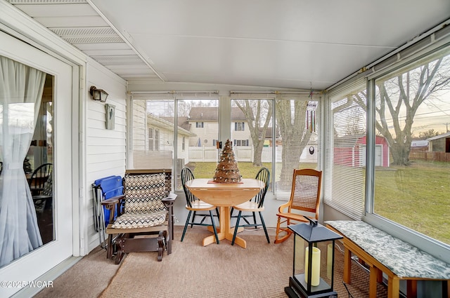 sunroom / solarium featuring plenty of natural light